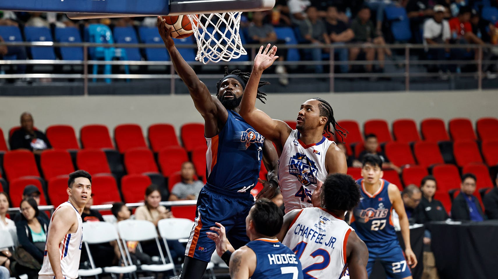 Meralco repulses NLEX, but prized import goes down with apparent foot injury